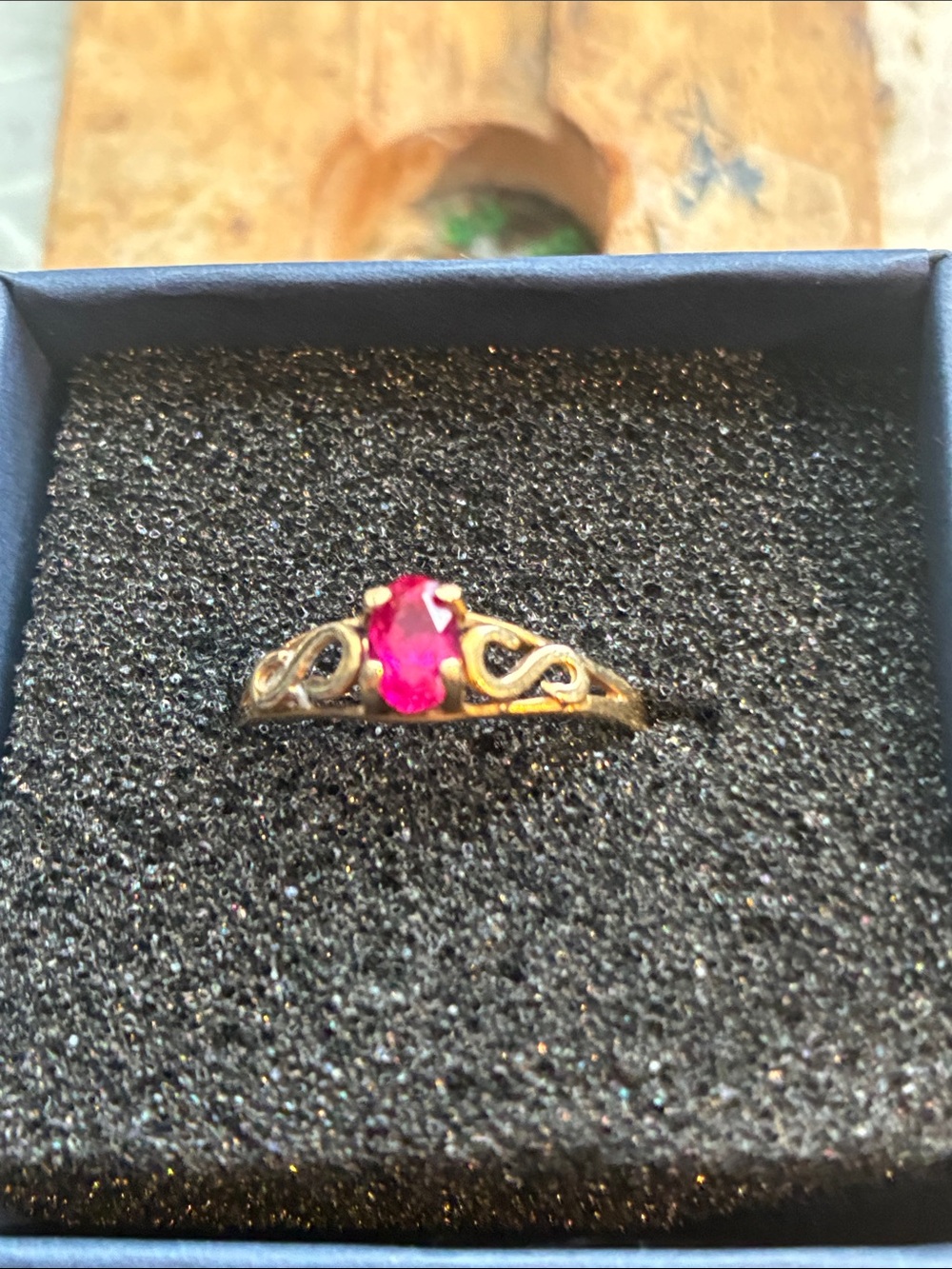 10k Ring with Pink Center Stone (Ruby?)
Size 7 3/4